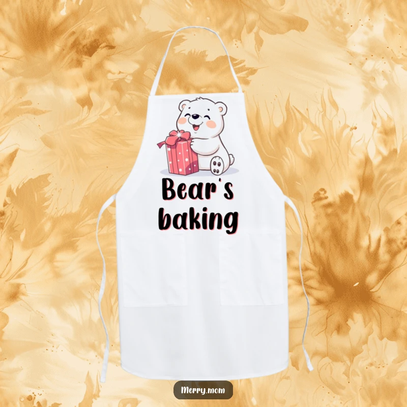 Funny apron depicting a smiling polar bear character joyfully unwrapping a sparkly gift, ready for holiday cooking and cheer.