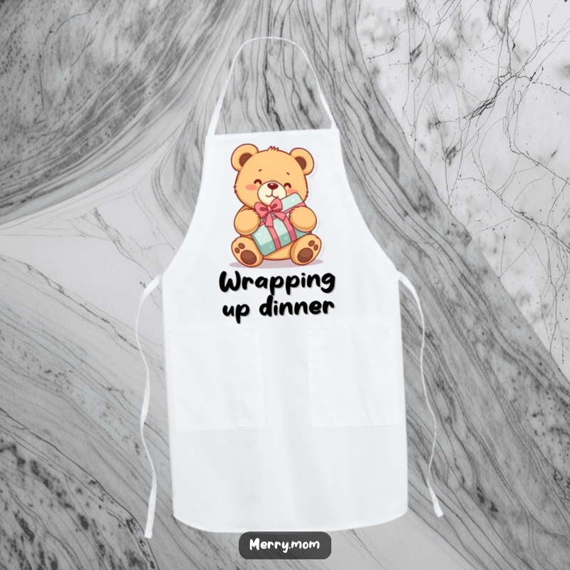 Funny apron depicting a kawaii teddy bear hugging a wrapped present, perfect for delightful kitchen moments.