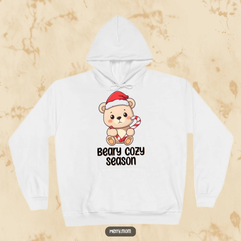 Funny hoodie featuring a sweet bear in a Santa hat, holding a candy cane.