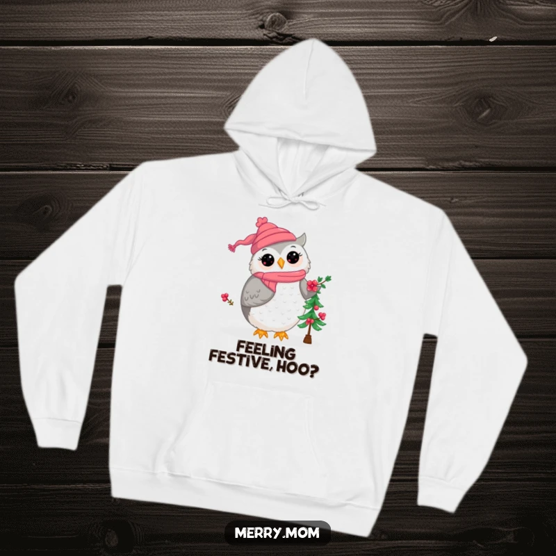 Kawaii owl mom character in a cozy hoodie, decorating a small Christmas tree with berry ornaments, perfect for winter holidays.