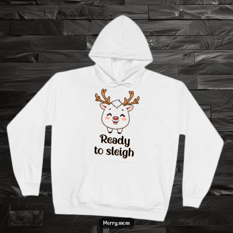 Funny hoodie featuring a creature with reindeer antlers and a wide, happy smile, perfect for cozy holiday moments.