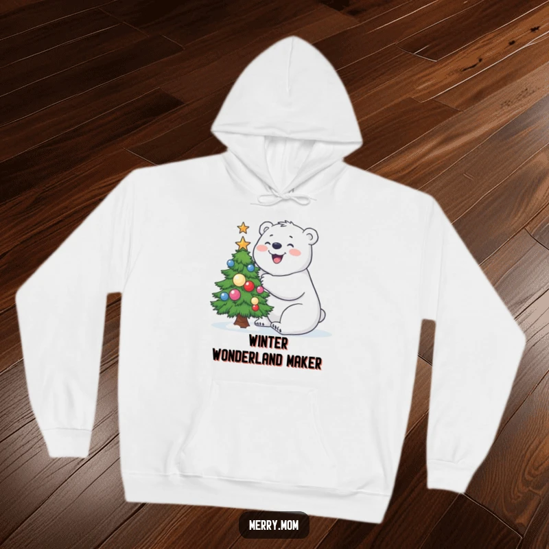 Funny Polar Bear Hoodie depicting a joyful polar bear busy building a small, decorated Christmas tree.