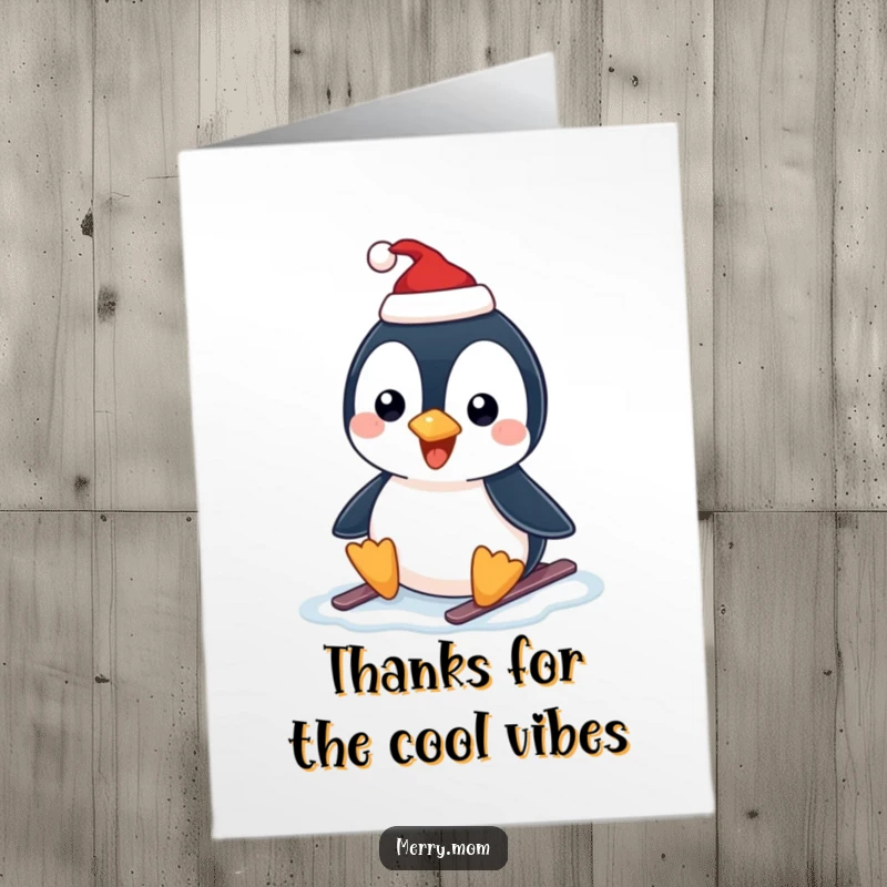 Funny Free Printable Thank You Card: A happy penguin wearing a Santa hat slides on ice, offering cool thanks.