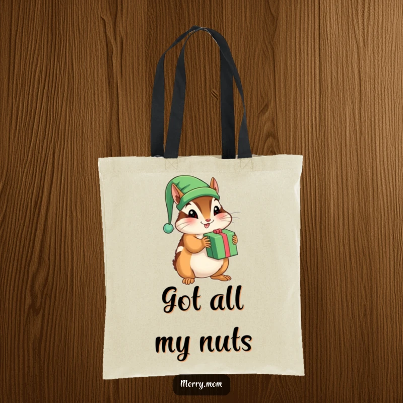 Funny tote bag with a playful chipmunk wearing an elf hat, shaking a gift bag.